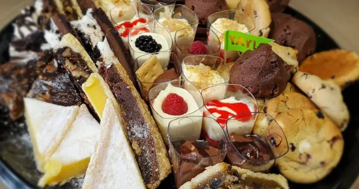 Catered dessert platter with cookies, brownies and sweet treats